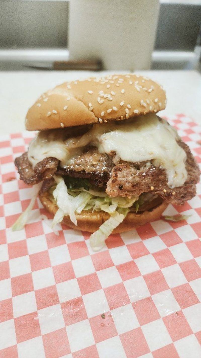 Sesame bun burger fresh off the grill